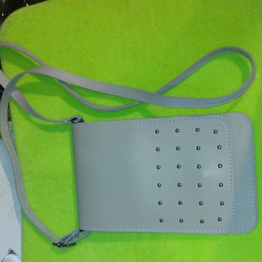 Women's grey studded cellphone carrying traveling bag